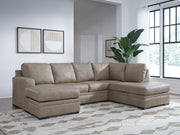 Ashley Furniture Amuleto sectional with chaise showcasing plush fabric and modern design in a cozy living room setting.