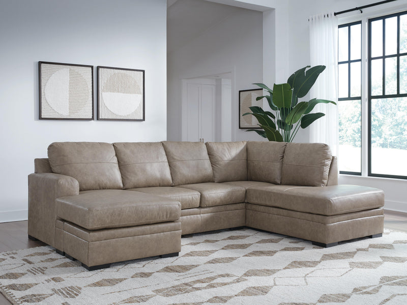 Ashley Furniture Amuleto sectional with chaise showcasing plush fabric and modern design in a cozy living room setting.
