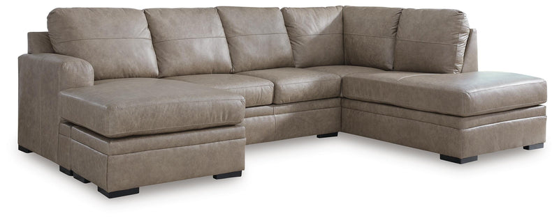 Ashley Furniture Amuleto sectional with chaise, featuring plush fabric and contemporary design, shown with multiple seating sections.