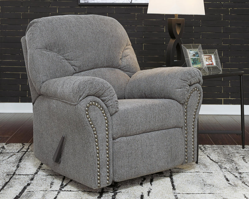 Ashley Furniture Allmaxx recliner with plush fabric and padded armrests, shown in a close-up view.