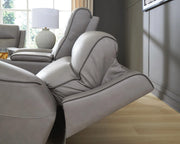 Ashley Furniture 5Z-Comfort power reclining living room set featuring plush upholstery and multiple seating options.