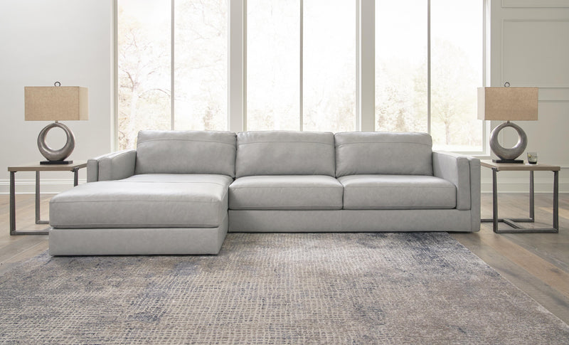 Ashley Furniture Amiata sectional with chaise, showing plush fabric upholstery and modern design from a front head-on view.