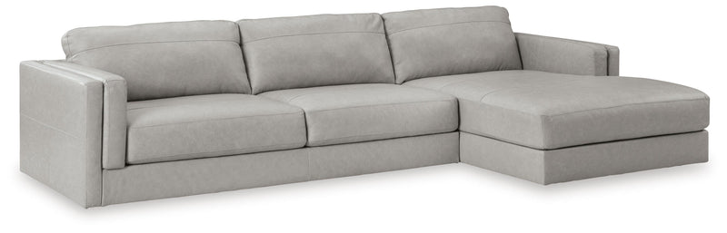 Ashley Furniture Amiata sectional with chaise, showcasing plush upholstery and modern design in a stylish living room setting.