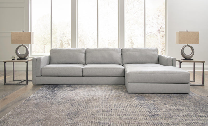 Ashley Furniture Amiata sectional with chaise, showing plush fabric upholstery and modern design from a head-on view.