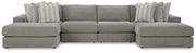 Ashley Furniture Avaliyah double chaise sectional with plush fabric, featuring multiple cushions and a spacious design.
