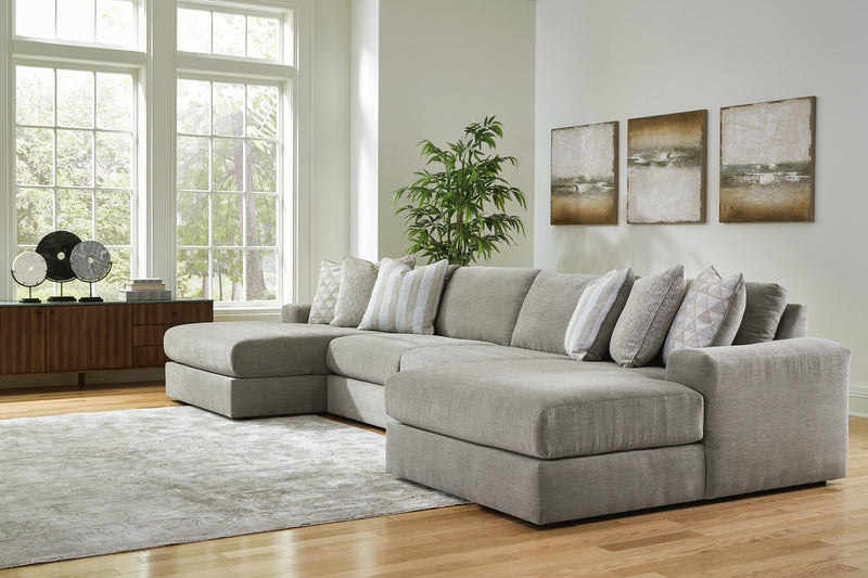 Ashley Furniture Avaliyah double chaise sectional showing plush fabric, multiple seating areas, and modern design in a living room setting.