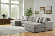 Ashley Furniture Avaliyah double chaise sectional showing plush fabric, multiple seating areas, and modern design in a living room setting.