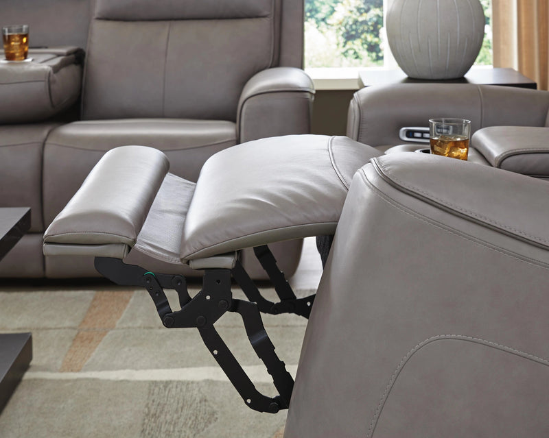 Ashley Furniture 5Z-Comfort Power Reclining Living Room Set featuring plush fabric upholstery and modern design.