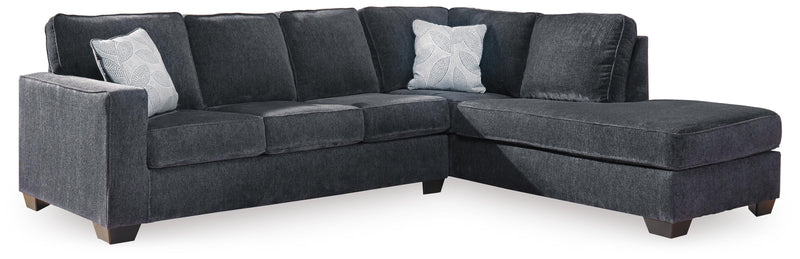 Ashley Furniture Altari sleeper sectional with chaise, showing beige fabric upholstery and modern sectional design.