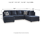 Ashley Furniture Albar Place sectional sofa with plush cushions and neutral upholstery, ideal for modern living rooms.