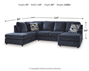 Ashley Furniture Albar Place sectional sofa with plush cushions and modern design in a cozy living room setting.