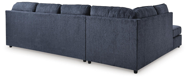 Ashley Furniture Albar Place sectional sofa with plush cushions and fabric upholstery, shown from the back view.