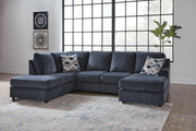Ashley Furniture Albar Place sectional sofa with plush cushions and modern design, shown in a neutral fabric.