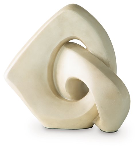 Ashley Furniture Feebs sculpture, modern decorative sculpture with abstract design in neutral tones, displayed on a wooden surface.