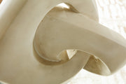 Close-up of the Feebs sculpture by Ashley Furniture, showcasing intricate details and artistic craftsmanship.