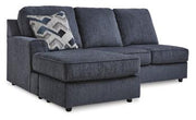 Ashley Furniture Albar Place sectional sofa with plush cushions and modern design, shown in a spacious living room setting.