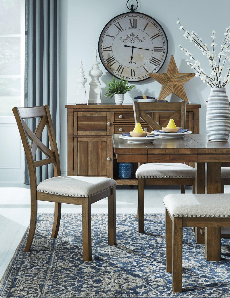 Ashley Furniture Moriville dining room set with wooden table and six upholstered chairs, arranged in a modern dining space.