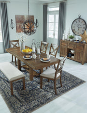 Ashley Moriville dining room set with a wooden table and six matching chairs in a modern dining space.