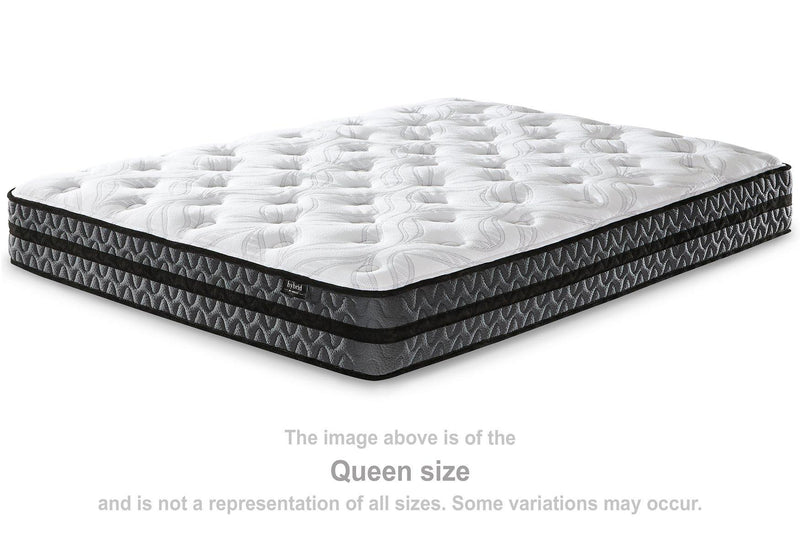 10-inch Ashley Furniture hybrid mattress with pocketed coil support and plush top, shown on a bed frame.