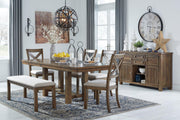 Ashley Moriville Dining Room Set with a wooden table and six upholstered chairs, showcasing a modern, elegant dining area.