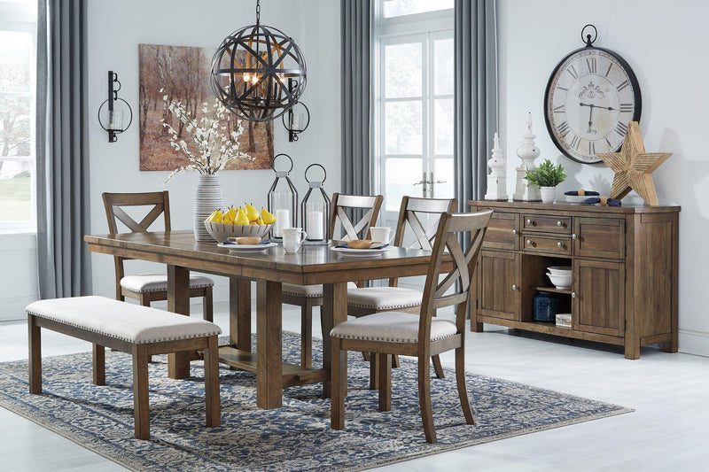 Ashley Moriville Dining Room Set with a wooden table and six upholstered chairs, showcasing a modern, elegant dining area.