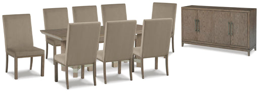 Ashley Furniture Chrestner dining room set with a table and six upholstered chairs in a modern design.