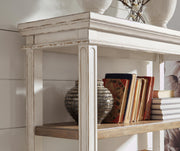 Close-up of the Ashley Furniture Realyn Home Office Set with wooden desk and matching office chair.