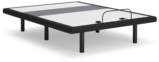 Ashley Furniture adjustable base with lumbar support and audio controls, shown with a modern bed setup in the image.
