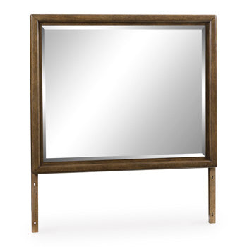 Ashley Furniture Baskinger bedroom mirror, angled view showing wood frame and reflective glass surface.