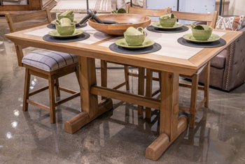 Ashley Furniture Gramburg counter height dining table with a wooden top and sturdy legs, ideal for casual dining spaces.