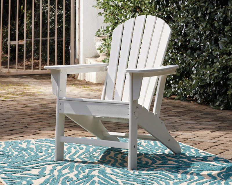 Outdoor table set from Ashley Furniture's Sundown Treasure collection, featuring a spacious table and matching chairs for outdoor seating.