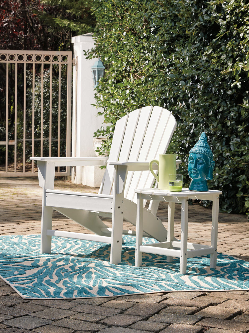 Ashley Furniture Sundown Treasure outdoor seating set with a table and chairs, ideal for patio or backyard relaxation.