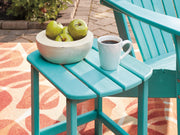 Outdoor table set from Ashley Furniture's Sundown Treasure collection, featuring a stylish table and matching seating for outdoor use.