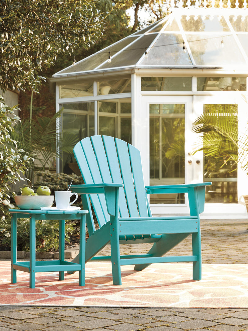 Ashley Furniture Sundown Treasure outdoor table set with a table and matching chairs for patio or garden use.