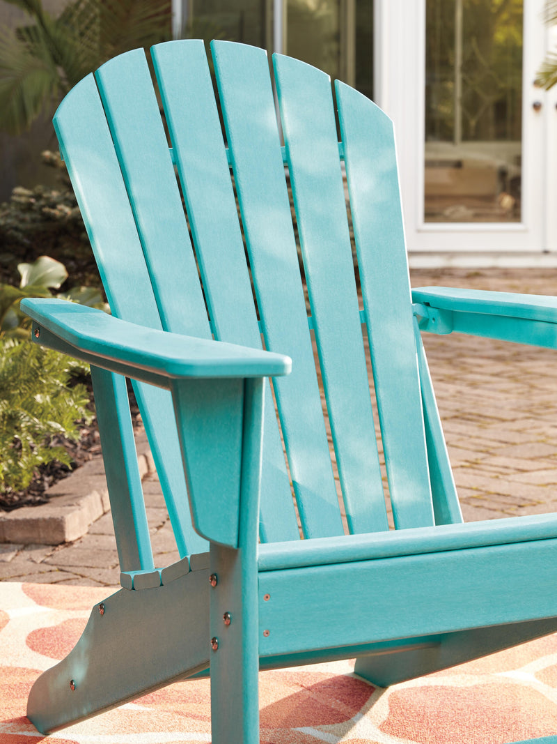 Outdoor table set by Ashley Furniture featuring a Sundown Treasure design, includes a table and matching seating for outdoor use.