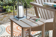 Ashley Furniture Sundown Treasure outdoor seating set featuring a table and chairs with woven detailing and plush cushions.