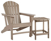Outdoor Sundown Treasure seating set by Ashley Furniture with a table and cushioned chairs on a patio.