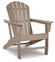 Outdoor table set from Ashley Furniture featuring a stylish seating arrangement with a table and chairs in a garden setting.