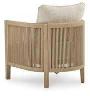 Set of two Ashley Furniture Spooners Cove outdoor lounge chairs with cushions, featuring a stylish design for patio relaxation.