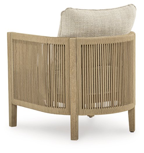 Set of two Ashley Furniture Spooners Cove outdoor lounge chairs with cushions, featuring a stylish design for patio relaxation.