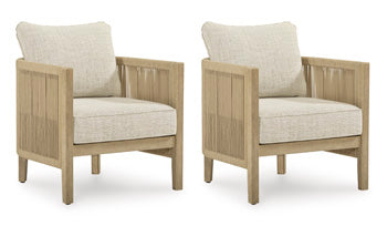 Set of two Ashley Furniture Spooners Cove outdoor lounge chairs with cushions, featuring weather-resistant design and modern outdoor style.