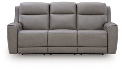 Ashley Furniture 5Z-Comfort Power Reclining Sofa showing plush fabric upholstery and built-in recliner mechanism.